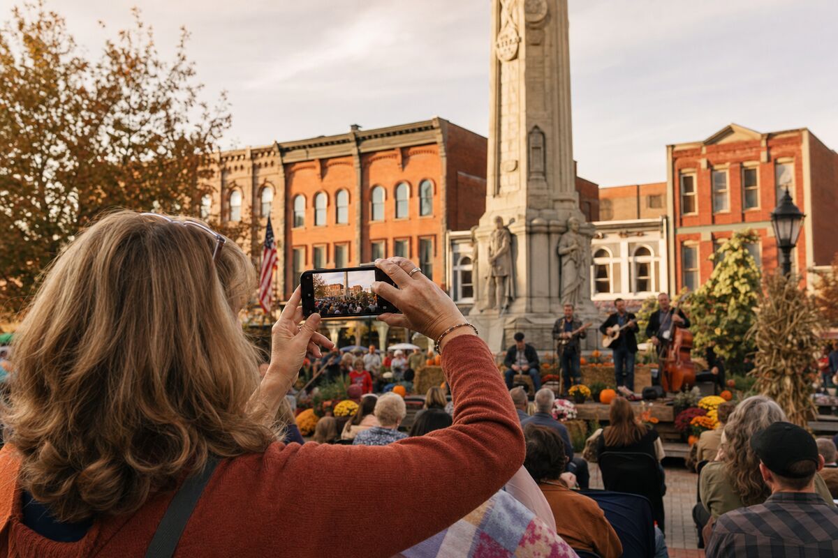 Someone filming and sharing the Easton festival on a phone